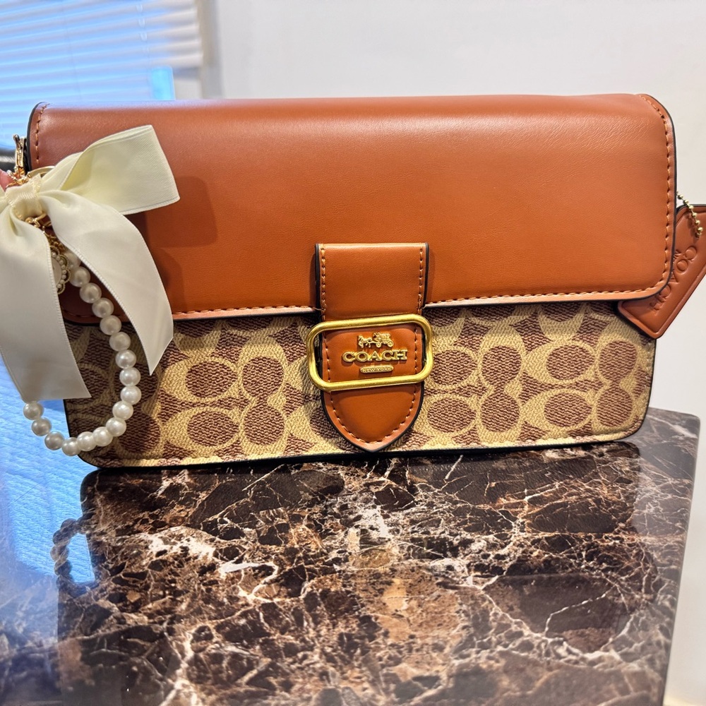 Coach Tan and Brown Crossbody Bag with Bow Accent